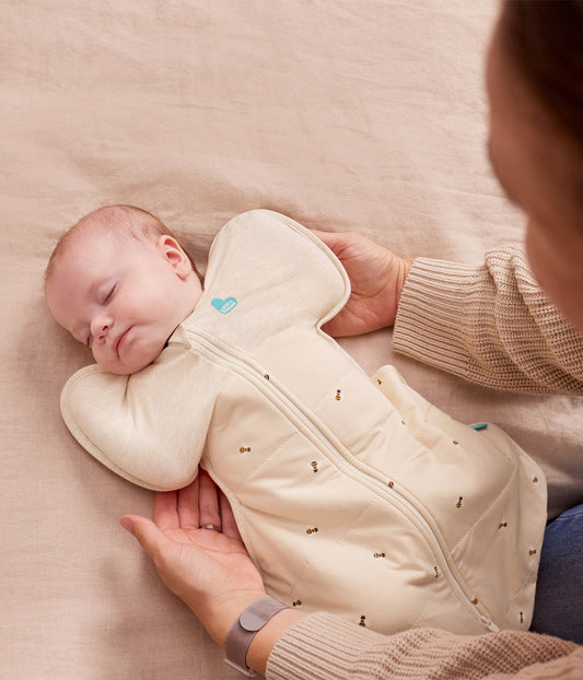 Baby sleeping in a Swaddle Up
